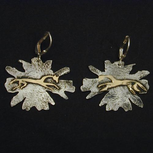 These striking mixed metal earrings are inspired by the Uffington Horse Chalk Figure in England. These earrings are 14 Karat gold on sterling silver with sterling silver lever-backs.